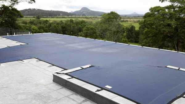 Blue leaf cover on split-level pool